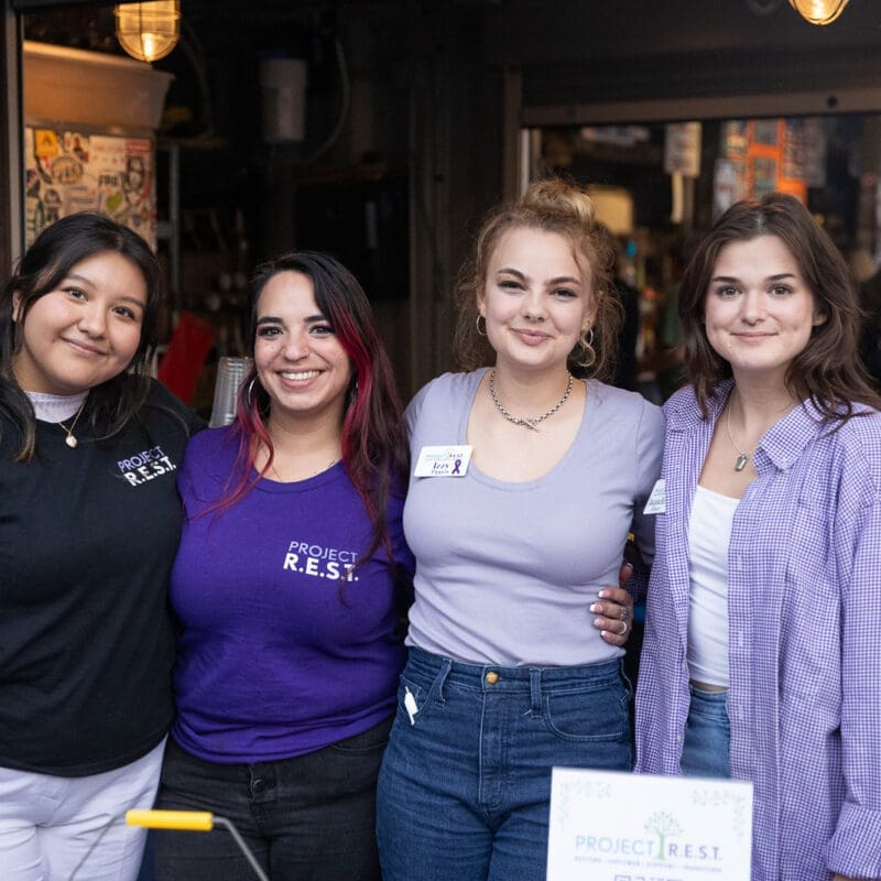Members of the Project R.E.S.T. Sexual Assault Victim Advocacy Team at Purple Pint Night in 2024.